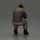 Gangster sitting in thought dressed casually with a beanie and jacket - Only-Games