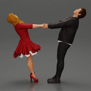 Couple leaning back holding hands enjoying a playful dance moment - Only-Games
