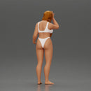 Confused Woman in Bikini Standing with Hand on Forehead - Only-Games