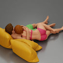 Couple cuddling affectionately on pillows wearing underwear - Only-Games