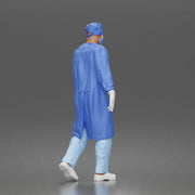 Surgeon walks down corridor wearing surgical gown face mask protective gloves - Only-Games