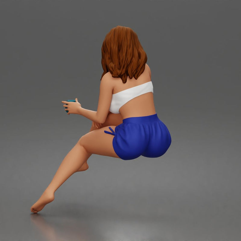 Relaxed woman sips morning coffee wearing summer top and shorts 1-24 - Only-Games