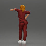 woman in jumpsuit leaning pointing forward ready for action - Only-Games