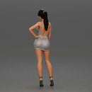 Woman in silver mini dress posing with hand on hip - Only-Games