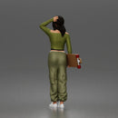Skater woman holding skateboard wearing crop top baggy pants sneakers