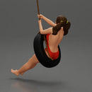 Sexy Girl in onepiece Enjoying a Fun Swinging Adventure on Tire - Only-Games