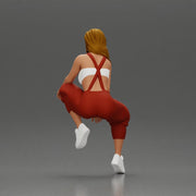 Street dancer in red overalls sitting stylishly on parked car - Only-Games