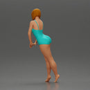 woman in a turquoise swimsuit striking a pose - Only-Games