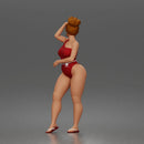 Standing woman shields eyes wearing swimsuit sunglasses earrings flip flops