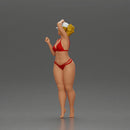 Stylish woman confidently posing in red bikini and white cap - Only-Games