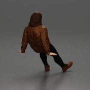 Man with long hair wearing brown jacket sitting with relaxed posture - Only-Games