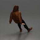 Man with long hair wearing brown jacket sitting with relaxed posture - Only-Games