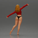 Golden dancer spins gracefully wearing red top and black bikini - Only-Games