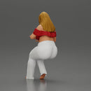 Blonde woman in red top white pants sitting applies hand cream - Only-Games