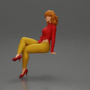 Stylish woman sitting confidently in red top yellow pants heels - Only-Games