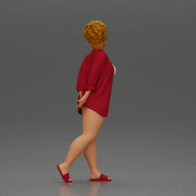 Chic woman in a red shirt and white bikini confidently walking - Only-Games