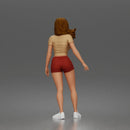 Trendy Woman Standing Confidently in Beanie, Crop Top, and Shorts