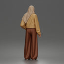 Relaxed Hijab Stander Posing in Jacket Shirt Pants and Sneakers