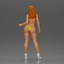 Sexy girl in bikini and heels posing on the beach - Only-Games