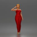 Elegant woman in sleeveless evening dress with side slit