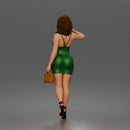 Elegant Woman Walking Confidently in Glamorous Dress, Heels, and Handbag