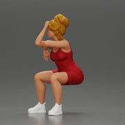 Stylish woman in red dress and sneakers striking dynamic pose - Only-Games