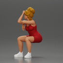 Stylish woman in red dress and sneakers striking dynamic pose - Only-Games