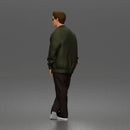 Man standing In Bomber Jacket Tee Trousers Sneakers And Sunglasses