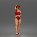 Standing woman shields eyes wearing swimsuit sunglasses earrings flip flops