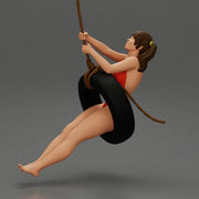 Sexy Girl in onepiece Enjoying a Fun Swinging Adventure on Tire - Only-Games