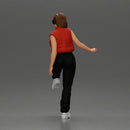 Woman in Headphones Lifting Leg in Stylish Streetwear - Only-Games