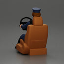 Focused officer in blue uniform driving seated holding steering wheel - Only-Games