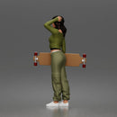 Skater woman holding skateboard wearing crop top baggy pants sneakers