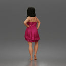 woman posing with hands on hips wearing ruffled dress