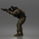 Tactical Soldier Aiming Steadily Wearing Combat Gear And Protective Helmet