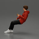 Casually sitting, holding a cup, enjoying a peaceful moment - Only-Games