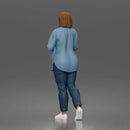 Woman Walking In Open Shirt Crop Top Jeans And Sneakers
