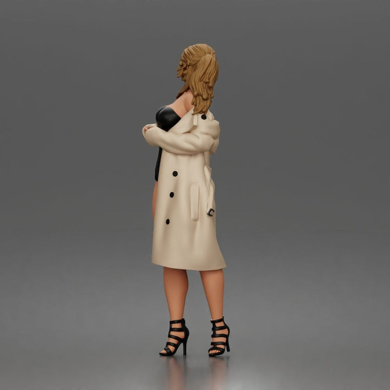 Woman Posing In Strapless Bodysuit With Long Coat And High Heel Sandals