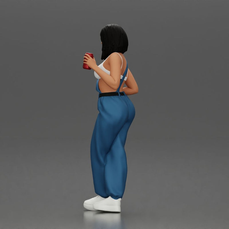 Woman with black hair wearing blue overalls holding a drink - Only-Games