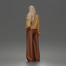 Relaxed Hijab Stander Posing in Jacket Shirt Pants and Sneakers