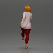 Woman in casual outfit joyfully kicks her leg with energy - Only-Games