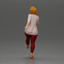 Woman in casual outfit joyfully kicks her leg with energy - Only-Games