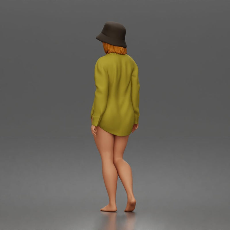 Standing woman In Oversized Button-Shirt With Bucket Hat Barefoot