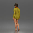 Standing woman In Oversized Button-Shirt With Bucket Hat Barefoot