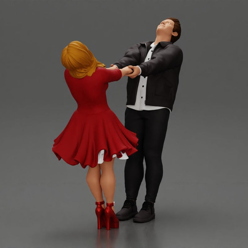 Couple leaning back holding hands enjoying a playful dance moment - Only-Games