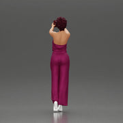 Fashionable woman in a jumpsuit snapping a selfie in style - Only-Games