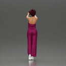 Fashionable woman in a jumpsuit snapping a selfie in style - Only-Games