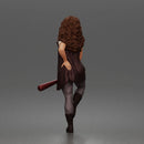 Woman Holding Bat Wearing Vest Pants Boots Confident Standing Pose
