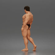 The muscular Arnold walks forward confidently showcasing his sculpted physique - Only-Games