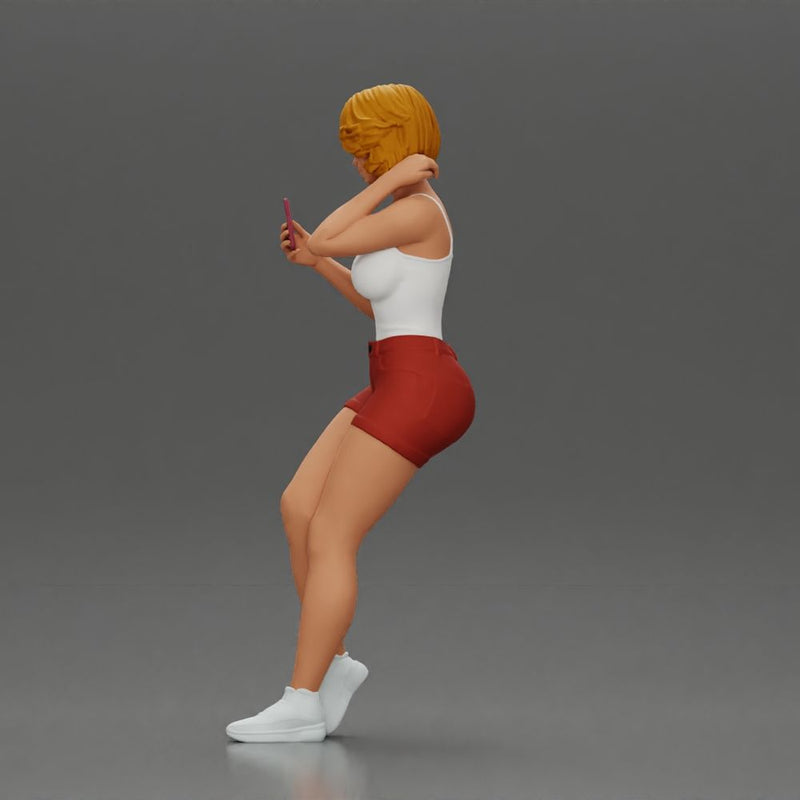 Girl casually checking her phone while striking a relaxed pose - Only-Games